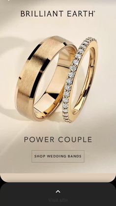 two gold wedding bands with diamonds on the inside and outside, in front of a white background