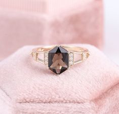 Smoky Quartz Hexagon Casual Ring, Natural Brown Crystal Fine Gemstone Rings, Paris Eiffel Tower Wedding Band Design, Geometric Shape Ring ✧･ﾟ: *✧･ﾟ:* Welcome to Charles Davin Jewelry*:･ﾟ･ﾟ✧ Moissanite - a gemstone known to bring in luck in someone's life, the user can give off a look of elegance. You can give your special someone luck whilst showing your love to them. ✶Material: 10K/ 14K/ 18K ✶Main Stone: Natural Smoky Quartz; 6*9mm ✶Side Stone: Moissanite; 0.15ct ✶Color: D Colorless ✶Clarity: V Elegant Octagon Rings With Accent Stones, Elegant Octagon Ring With Accent Stones, Fine Jewelry Faceted Diamond Wedding Ring, Faceted Diamond Wedding Ring Fine Jewelry, Faceted Diamond Wedding Ring, Elegant Octagon Diamond Ring With Accent Stones, Wedding Fine Jewelry Diamond Ring With Facets, Luxury Octagon Faceted Ring, Octagon Diamond Wedding Ring With Prong Setting