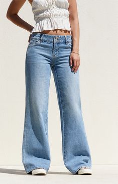 Step up your style this season with the Medium Indigo Double Button Low Rise Baggy Jeans from PacSun. Featuring a trendy low-rise waist and an ultra-slouchy full-length leg, these jeans offer a relaxed, baggy fit that exudes laid-back vibes. Complete with a classic 5-pocket body and a double button front zip fly closure, they're the perfect combination of comfort and style for any casual occasion. They're crafted from sustainably sourced rigid cotton for a durable and eco-conscious update.

Learn more about PacSun eco items Casual Medium Wash Flare Jeans With Button Closure, Trendy Relaxed Fit Flare Jeans With Button Closure, Summer Denim Blue Flare Jeans With Button Closure, Casual Light Wash Flare Jeans With Button Closure, Casual Straight Leg Flare Jeans With Button Closure, Summer Jeans With Button Closure, Casual Summer Flare Jeans With Button Closure, Trendy Summer Flare Jeans With Button Closure, Summer Full-length Jeans With Button Closure