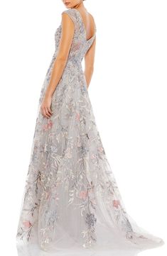 Shimmering embroidered flowers define this sequin-patterned ballgown with a plunging V-neckline and floor-sweeping train. 63" length V-neck Cap sleeves Partially lined 100% polyester Spot clean Imported Asian Owned/Founded Elegant Floral Embroidery Evening Dress For Debutante Ball, Elegant Floral Embroidered Evening Dress For Debutante Ball, Floral Embellished Floor-length Gown For Debutante Ball, Floral Embroidered Evening Dress For Debutante Ball, Floral Floor-length Gown For Debutante Ball, Floor-length Gown With Floral Embroidery For Debutante Ball, Floor-length Floral Embroidery Evening Dress For Debutante Ball, Floor-length Floral Embroidered Evening Dress For Debutante Ball, Floral Embroidered V-neck Wedding Gown