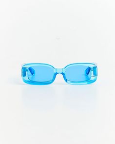 The Cahil Sunglasses by Insight come in a blue colourway. This style is designed with a transparent frame and blue tinted lenses. These sunglasses also feature a slim rectangular shape and comfortable nose bridge. Luxury Blue Shield Sunglasses With Anti-reflective Coating, Luxury Blue Sunglasses With Mirrored Lenses, Luxury Blue Cat Eye Sunglasses, Luxury Blue Sunglasses For Formal Occasions, Luxury Blue Sunglasses For Outdoors, Luxury Blue Sunglasses For Outdoor, Luxury Blue Sunglasses For Men, Luxury Blue Men's Sunglasses, Luxury Blue Tinted Cat Eye Sunglasses