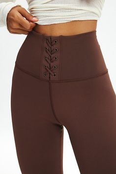 Better-than-basic Strut This legging made special with lace-up detailing at the waist. Designed in a soft & stretchy performance knit featuring a high-rise and cropped ankle length. Features Strut This Kennedy lace-up ankle legging Athleisure pant Soft & stretchy performance knit High rise waistline with lace-up detail Slim stretch fit Cropped ankle length Easy pull-on style Content + Care 76% Polyester, 24% spandex Machine wash Imported Size + Fit Model in Brown is 5’8" and wearing size Small M Chic Zip Fly Bottoms At A Cheap Price, Athleisure Pants, Men's Shoes Accessories, Ankle Length Leggings, Ankle Leggings, Women Men Shoes, Womens Activewear, Small Waist, Ankle Length