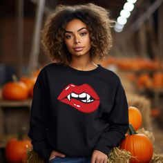 Halloween Shirt for Woman, Halloween Party Costume, Vampire Lips Shirt, Halloween Gift Tee, Funny Halloween Shirt, Lips Shirt, Vampire Shirt ~~ Please check all color and size charts before place the order. Since all shirts are custom made based on your selection, I don't accept return or exchange unless there is an issue with your order. ~~ High quality and super soft, comfortable shirt. Made with top-of-the-line vinyl and pressed with a professional grade heat press. ~~ Processing time is 1-3 Gothic Long Sleeve T-shirt For Fall, Halloween Cosplay Long Sleeve Tops, Edgy Long Sleeve Halloween Tops, Punk Tops For Costume Party In Fall, Gothic Long Sleeve Shirt For Halloween, Fall Cosplay Long Sleeve Tops, Punk Tops For Fall Costume Party, Gothic Top For Costume Party In Fall, Gothic Tops For Costume Party In Fall