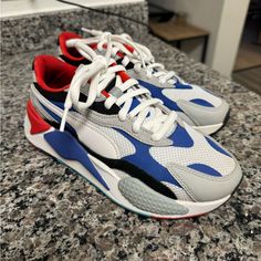 Puma Rs-X3 Puzzle Sneakers. White In Color With Blue And Red Detail. Kid’s Size 5.5/Women’s Size 7. Brand New And Never Worn. Casual Puma Running Shoes For Jogging, Puma Basketball Shoes With Round Toe, Puma High-top Synthetic Running Shoes, Low-top Synthetic Puma Basketball Shoes, Casual Puma Basketball Shoes In Synthetic, Puma Rs-x Shoes, New Puma Sneakers, Puma Rs X3, White Athletic Sneakers