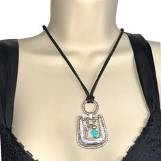 This Unique Upcycled Pendant Features A Vintage Belt Buckle Adorned With A Silver Turquoise Cross And Pearl, All On A Western Style Leather Necklace. It's A True Statement Piece That Perfectly Blends Rustic And Elegance. Upcycled Vintage Belt Buckle Adorned With Silver Turquoise Cross Accented With A Pearl Western Style Leather Necklace I Design All My Pieces By Using Mixed Media Art, Boho Style Metalwork And Incorporating Vintage And Antique Relics To Create Something New From Something Old, He Handmade Turquoise Necklaces For Everyday Use, Handmade Turquoise Necklace For Everyday Use, Bohemian Blue Necklaces For Everyday Use, Blue Bohemian Necklaces For Everyday Use, Belt Buckle Jewelry, Upcycled Vintage Jewelry, Buckle Necklace, Turquoise Western, Turquoise Cross