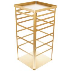 a gold metal rack with multiple trays on each side and one shelf below it