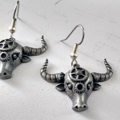 Bull Head Earrings In Steampunk Style, Silver Metal, Full Of Details, Longhorns Bull Earrings, Great For The Rodeo Nite Out, Cowgirl Jewelry, Animal Jewelry. Ready To Ship! Come See More Earrings At My Shop... Come Visit My Shop Didigifts Bull Earrings, Michael Kors Earrings, Black Stone Earrings, Green Charms, Rose Gold Hoop Earrings, Crystal Pearl Earrings, Bull Head, Bling Earrings, Cowgirl Jewelry