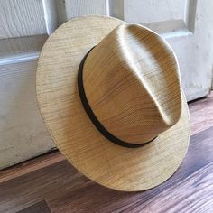 Stay stylish in our Mexican straw hats, ideal for any occasion. MADE IN MEXICO By: Mexican Artisans For: Unisex Size: Mediumm (23") Color: wheat Details: Palm Straw Leather Band Inner elastic band Contact us for more details PLEASE READ BEFORE PURCHASE: The picture is an ACCURATE REPRESENTATION.Colors in the pictures may vary a little by effects of light. Each product is handmade from Mexico causing differentiation and minor imperfections in each piece making them that much more unique. We striv Casual Beige Woven Hat Band, Casual Straw Panama Hat With Flat Brim, Casual Adjustable Straw Hat Bands, Casual Beige Straw Hat Bands, Casual Adjustable Woven Fedora, Adjustable Straw Panama Hat For Casual Wear, Casual Panama Hat With Adjustable Flat Brim, Adjustable Straw Panama Hat, Casual Adjustable Straw Panama Hat