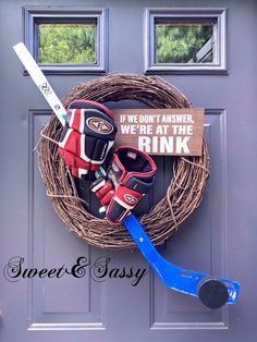 a hockey themed wreath on the front door