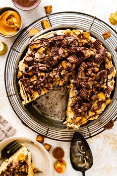 a chocolate chip pie on a plate with one slice cut out and ready to be eaten