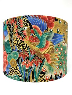 a decorative lamp shade with colorful birds and flowers on black fabric, designed by japanese artist kimono