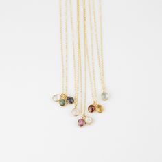 The Gema Necklace is crafted with a semi-precious gemstone suspended on a delicate chain. It features a natural and genuine gemstone. Showcasing stunning elegance and unique style, this birthstone necklace makes a perfect gift or personal keepsake. Gemstone size: Approximately 7x5mm Materials: 14K Gold Filled, Vermeil SHOP POLICY Non-returnable items: Earrings Personalized Items Items on sale FINAL SALE: Unpersonalized orders placed within the context of a site-wide sale or any kind of discount Dainty Round Pendant Gemstone Necklace, Teardrop Pendant Crystal Necklace With Birthstone For Gifting, Teardrop Pendant Birthstone Crystal Necklace For Gift, Teardrop Pendant Crystal Necklace With Birthstone As Gift, Gift Crystal Teardrop Pendant Necklace With Birthstone, Delicate Gold Necklaces With Gemstone Accents, Delicate Everyday Birthstone Gemstone Necklace, Delicate Gold Necklace With Gemstone Accents, Delicate Birthstone Necklace With Gemstone