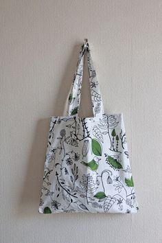 Field Bird Soft tote bag with storage pouch with fresh birdies and leaf pattern. Practical, beautiful and handmade with love. It has a pattern that varies from front and back as shown in the pictures. Perfect for shopping as this tote comes with a storage bag so you can keep it in your handbag and bring it out whenever you need it. Reusing with style! 100% cotton and washable. Measurements: 37 cm x 37 cm, Handles 28 cm high. Do see more delightful items our my Etsy shop: www.etsy.com/uk/shop/Luc Nature Birds, Storage Pouch, Bring It, Leaf Pattern, Storage Bag, Uk Shop, Bag Storage, Reusable Tote Bags, Accessory Gift