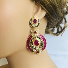 Pink Kundan Earrings/ Golden Ruby Earrings/ Statement Earrings/ Ruby Pink Cubic Zirconia Earrings/ Ethnic Ruby Indian Earrings Made in Brass with very high quality Semi-Precious Ruby Stones and Black meenakari Length: Approx. 2 Inches Comes with Push back closure Lightweight Earrings suitable for any traditional Indian pr Cocktail Outfit This pair of earring is made in Matte Gold finish with Semi precious stone beads with Push back closure.  Very Elegant and stylish, these earrings can be paired with any traditional Indian or Western Attire depending upon the occasion and the theme.  Very lightweight, hand carved and made with with extreme love and care.  This earring will complete your look for any requirement of jewelry to go with your favorite attire. Suitable for weddings, babyshower, Ornate Jeweled Earrings For Festive Occasions, Traditional Jeweled Drop Earrings Danglers, Traditional Jeweled Earrings For Festivals, Jeweled Drop Earrings For Festivals, Jeweled Drop Danglers For Festivals, Ornate Red Earrings For Festivals, Elegant Ceremonial Jeweled Earrings, Ornate Meenakari Drop Earrings, Traditional Jeweled Chandbali Earrings