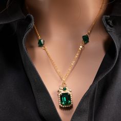 EMERALD BEAUTY. Pendant was once part of a vintage necklace. Featuring tiny pearls set in gold on a gold chain divided by Swarovski crystal beads. Polishing cloth included. Vintage Gold Emerald Necklace For Formal Occasions, Vintage Gold Necklace With Emerald, Elegant Green Pendant Chain Necklace, Vintage Gold Necklace For May Birthstone, Elegant Gold Emerald Necklace For Party, May Birthstone Gold Vintage Necklace, Gold Plated Jeweled Necklaces As Gifts, Emerald Jeweled Necklaces As Gifts, Emerald Jeweled Necklaces For Gifts