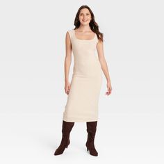 Get ready to take on off-duty days in chic style with this Knit Scoop Neck Midi Bodycon Dress from Universal Thread™. Crafted from lightweight ribbed fabric, the midi bodycon dress offers a beautiful balance of comfort and style. It's finished with a cool scoop neckline, elevated by a fitted bodice for a flattering look. Keep it casual with sneakers or dress it up with sandals or pumps and statement accessories. Universal Thread™: Found exclusively at Target.