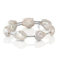 This chic bangle pearl bracelet features nine  9mm white baroque freshwater pearls. The pearls are mounted on the finest 18K gold bangle bracelet, with your choice of white gold or yellow gold. The bangle comes in a standard one size fits all. This item comes packaged in a beautiful jewelry gift box, perfect for gifting. Luxury Baroque Pearl Bracelet In Pearl White, Elegant Adjustable Mother Of Pearl Beaded Bracelets, Elegant Beaded Baroque Pearl Bracelets, Pearl White Bangle Pearl Bracelet, Pearl White Pearl Bangle Bracelet, Elegant Bangle Bracelet In Mother Of Pearl, Elegant Adjustable Mother Of Pearl Bracelet, Luxury White Baroque Pearl Bracelets, Pearl White Bangle Bracelet With Pearl Charm