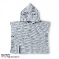 a crocheted hooded sweater with buttons on the chest and hood is shown in grey