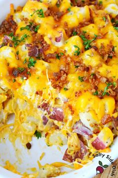 a casserole dish with meat, cheese and vegetables