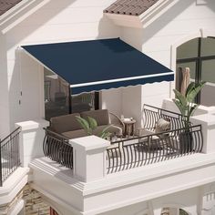 an awning on the balcony of a house