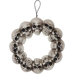 a wreath with skulls hanging from it