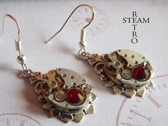 Steampunk bridal siam reinassance Earrings Steamretro -Steampunk Jewelry - Steampunk Jewellery -personalized jewelry -bridesmaid earrings The smallest vintage watch mechanisms that you can imagine, that still retain all the detail you would expect from Swiss workmanship, set on Trinity Brass, silver plated findings made in the good old US of A! Ive added sterling silver hooks, and these beautiful red siam Swarovski elements! Would make a unique and stunning gift, an perfect gifts for your brides Steampunk Jewellery, Steampunk Goggles, Steampunk Earrings, Steam Punk Jewelry, Steampunk Accessories, Gothic Earrings, Jewelry Bridesmaid, Watch Parts, Jewelry Personalized