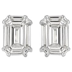 This elegant pair of diamond stud earrings showcases two emerald cut diamonds with a total weight of 0.88ct. They are graded at E-F in color, VS1-VS2 in clarity and measure 7.80 x 5.40mm. They are set in a double prong, 18k white gold setting. Modern Emerald Cut Diamond Earrings, Gia Certified Baguette Cut Timeless Diamond Earrings, Timeless Emerald Cut Diamond Earrings, White Emerald Cut Diamond Earrings, Classic Platinum Emerald Cut Diamond Earrings, Classic Emerald Cut Platinum Diamond Earrings, Emerald Cut White Gold Diamond Earrings, Timeless Emerald-cut Vvs Clarity Diamond Earrings, Timeless Emerald Cut Diamond Earrings With Vvs Clarity