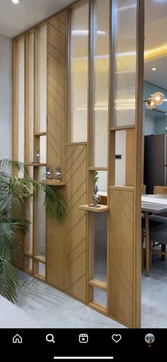 an open wooden door leading to a dining room