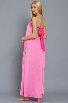 Strapless color block maxi dress featuring an open back design and a tie in the back detail. NOTE: If your size is not available, please register your email in EMAIL ME WHEN AVAILABLE link. Spring Backless Maxi Dress With Side Slits, Chic Pink Maxi Dress For Beach Cover-up, Spring Beach Maxi Dress With Cutout Back, Chic Backless Maxi Dress For Beach Season, Sleeveless Maxi Dress With Side Slits For Beachwear, Strapless Beachwear Maxi Dress For Party, Chic Halter Neck Maxi Dress With Side Slits, Backless Tie Back Maxi Dress For Brunch, Backless Maxi Dress For Day Out