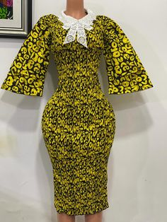 Ankara dress made with with lace collar Party Dresses With Smocked Bodice And Stretch Fit, Party Dresses With Smocked Bodice And Stretch, Elegant Fitted Smocked Dress With Lace Trim, Fitted Smock Dress For Party, Yellow Smocked Bodice Midi Dress, Elegant Fitted Dress With Elastic Neckline, Fitted Dress With Lace Trim And Ruffled Collar, Yellow Midi Dress With Smocked Bodice, Fitted Smock Midi Dress