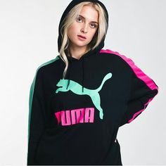 Puma Classic Logo Sweatshirt Hoodie In Size Small. I Love The Retro Vibe With The Hot Pink And Teal Colors! Longer Style Sweatshirt; 27”. 2 Hidden Front Pockets! Large Chest Puma Logo! Side Note! I Have This Style Pair Of Leggings Also Listed In My Closet, As An Outfit With A Crop Style Hoodie* Willing To Separate Items Or Create An Outfit With This Sweatshirt And Those Leggings* Message Me! Or Add All Items To A Bundle For A Discount! See Item Details In Pics! Ask Any Questions A Reasonable Off Pink Hooded Sweatshirt For Sports Season, Pink Hooded Sweatshirt For Sports, Casual Pink Activewear With Letter Print, Casual Pink Letter Print Activewear, Trendy Sports Hoodie With Logo Print, Casual Pink Activewear With Graphic Print, Casual Pink Winter Activewear, Trendy Pink Crew Neck Activewear, Pink Fleece Athleisure Top