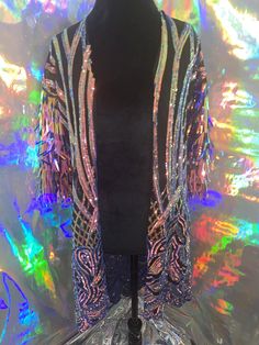 Please advise, Must be worn with care. Sequins may fall out if tugged or worn roughly. Perfect for music festivals and nights out with friends! For Jackets size please review size chart in photos. Please list size and comment box at check out or send DM. Custom sizing available. Please advise, Must be worn with care. Sequins may fall out if tugged or worn roughly. Metallic Disco Outerwear For Party, Metallic Sequined Outerwear For Party, Metallic Sequined Party Outerwear, Metallic Sequin Party Outerwear, Metallic Outerwear For Fall Party, Disco Style Winter Festival Outerwear, Winter Festival Disco Outerwear, Spring Sequin Outerwear For Costume Party, Disco Sequined Outerwear For Party