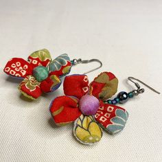 Textile Earrings Handmade, Unique Flower Shaped Single Earring, Unique Single Flower Earring, Red Flower-shaped Earrings With Ear Wire, Red Flower Shaped Earrings With Ear Wire, Unique Flower-shaped Nickel-free Earrings, Nickel-free Flower Earrings, Flower-shaped Earrings With French Hook As Gift, Traditional Flower-shaped Earrings With Ear Wire