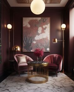 a living room with two chairs, a table and a large painting on the wall