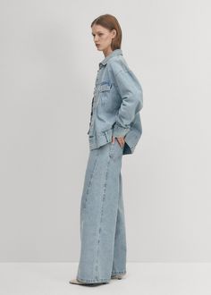 Blue denim wide-leg jeans With plenty of wiggle room for the legs, the Magda denim pants live up to both comfort and fashion. While they hug the hips tight, they’re cut with a relaxed fit everywhere else. Say what you will, but we love the low-rise waistline making a case for 90’s jeans. Modern Wide Leg Denim Cargo Jeans, Elevated Casual Denim Wide-leg Pants, Wide-leg Denim Bottoms For Elevated Casual, Wide-leg Denim Pants For Casual Wear, Light Wash Wide-leg Pants With Five Pockets, Wide-leg Light Wash Pants With Five Pockets, Modern Denim Wide Leg Pants With Pockets, Denim Pants With Five Pockets For Elevated Casual, Denim Pants For Elevated Casual Occasions