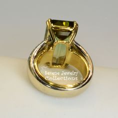 Rare bi-color green yellow tourmaline 18k white and yellow gold diamond vintage ring! The tourmaline is a rare bi-color green and yellow and has a different look depending on the viewing angle! The band is set with 40 white round diamonds totaling .8 carats. Ring Size: 6.5 Total Weight: 18.3 grams Precious Metal: 18k white and yellow gold Precious stones: -Green Yellow Bi-color Tourmaline center stone: 16.98 carats, 18.8mmx11mm -White Round Diamonds: 0.8 carats, QTY 40 Hallmark: 750 Luxury Gold Tourmaline Rings, Classic Tourmaline Jewelry With Polished Finish, Formal Yellow Gold Tourmaline Jewelry, Formal Yellow Gold Emerald Ring, Formal Gold Jewelry With Tourmaline, Formal Gold Tourmaline Jewelry, Polished Tourmaline Jewelry For Anniversary, Classic Green Tourmaline Jewelry, Tourmaline Yellow Gold Jewelry With Center Stone