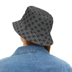 First, it protected fishermen from rain in the 1900s. Now, the personalized bucket hat is making its way to the very top of fashion picks for all ages. .: Material: 100% polyester.: Available in 2 sizes.: Sewn-in label.: Made in USA Small Large Circumference, in 22.01 24.02 Crown height, in 5.51 5.91 Brim length , in 2.17 2.17 Vintage Black Adjustable Sun Hat, Vintage Black Bucket Hat For Summer, Retro Black Adjustable Bucket Hat, Retro Adjustable Black Bucket Hat, Vintage Black Bucket Hat, Retro Black Brimmed Bucket Hat, Vintage Black Brimmed Sun Hat, Casual Black Bucket Sun Hat, Vintage Black Bucket Hat With Curved Brim