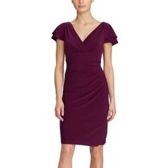 This Beautiful Plum Lauren Ralph Lauren V-Neck Ruched Flutter Sleeve Dress Has A Beautiful Color And Has A Lot Of Stretch To It. The Material Is 95% Polyester And 5% Elastane, And The Color Is A True Plum Purple- Exotic Ruby Red, And Is An Absolute Stunner. Tailored With Flirty Flutter Sleeves And A Color That Is Great For The Fall, Lauren Ralph Lauren's Dress Is The Epitome Of Effortless Feminine Style In Slinky, Body-Skimming Matte Jersey. Crossover Ruched V-Neckline Flutter Sleeves With Soft Purple Fitted Dress With Flutter Sleeves, Fitted Purple Dress With Flutter Sleeves, Fitted Purple Dresses With Flutter Sleeves, Purple Ruched V-neck Dress, Elegant Purple Dress With Surplice Neckline, Crossover Skirt, Ralph Lauren Dress, Flutter Sleeve Dress, Plum Purple