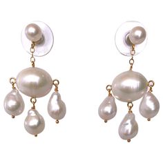 Classic White Drop Chandelier Earrings, Elegant White Drop Chandelier Earrings, High Luster Drop Earrings, White High Luster Drop Pearl Earrings, Elegant White Clip-on Chandelier Earrings, Classic White Pearl Drop Chandelier Earrings, Pearl White Drop Jewelry With High Luster, Luxury White Briolette Earrings, White High Luster Pearl Drop Earrings