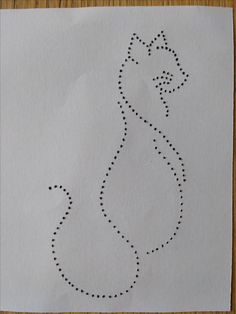 a piece of paper with a drawing of a cat in the shape of a tear