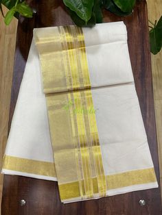 Gold Kasavu Mundu/ Dhothi is the traditional clothing of men in Kerala, South India. It is handcrafted to perfection using the finest quality cotton and good quality half fine gold Kasavu. This is an authentic branded handloom Dhothi woven by one of our master weavers. Our village Balaramapuram is famous for it's craftsmanship and fine quality Kasavu fabrics. Weaving Method: Handloom/ Pit loom Type: Double Length : 4mtrs Width :1.25 mtrs Color: offwhite Jerry: Fine Quality This natural cotton mu Gold Cotton Kurta For Diwali, Gold Kurta With Traditional Patterns For Ceremonies, Traditional Gold Kurta For Puja, Festive Gold Cotton Kurta, Festive Gold Cotton Traditional Wear, Gold Cotton Traditional Wear With Drape, Festive Gold Cotton Dupatta, Cotton Traditional Wear With Zari Weaving For Wedding, Cotton Traditional Wear For Ceremonial Diwali