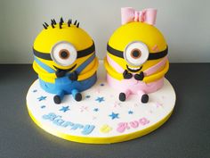 two cakes decorated to look like minion characters