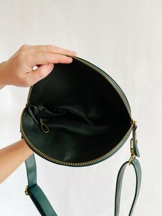 Our newest any-way, hands-free pack now in vegan leather! Wear this stunning Evergreen bag cross body across your chest or to your hips, around your waist as a belt bag, or over your shoulder as your new on-the-go purse. The options are endless no matter what size you are or how you want to wear it. The strap can easily clip or unclip for adjusting and lengthens up to 46 inches. Add a fabric strap for a more casual look! dimensions:9.25" across top (folded)8" across bottom1.5" deep6.5" high (fol Baggy T-shirt, Fabric Strap, Leather Wear, Hands Free, Belt Bag, Cross Body, Casual Looks, Vegan Leather, Leather Straps