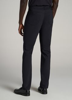 Stay Effortlessly On-Trend in Our 365 Stretch 5-Pocket Pants for Tall Men Unmatched Style in Every Stitch Our 365 Stretch 5-Pocket Men's Tall Pants are all about offering year-round style and an ideal fit. Designed for tall men, these extra-soft pants offer a sleek, tapered fit that's perfect for any event. Experience a new standard in tall men's pants that are as wrinkle resistant as they are comfortable, making them an essential for life on the go. Tapered fit, tailored for tall men over 6' Ex Black Slim Fit Bottoms With Pockets, Black Slim Fit Work Pants With Pockets, Black Pants With 4-way Stretch And 5-inch Inseam, Black Slim Fit Work Pants With Welt Pockets, Slim Fit Black Work Pants With Welt Pockets, Black Straight Leg Bottoms With Functional Pockets, Stretch Black Work Pants With Pockets, Black Stretch Work Pants With Pockets, Black Stretch Straight Leg Work Pants