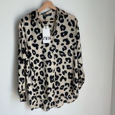 Beautiful Animal Print Buttondown Shirt. 100% Polyester Runs Large. Please Let Me Know If You Need Measurements You Will Love This Shirt! Chic Printed Button-up Shirt, Casual Printed Button-up Blouse, Leopard Print Long Sleeve Top With Buttons, Long Sleeve Leopard Print Top With Buttons, Trendy Beige Shirt With Buttons, Casual Collared Leopard Print Tops, Zara Shirt For Day Out In Fall, Trendy Beige Shirt With Button Closure, Cream Long Sleeve Shirt For Day Out