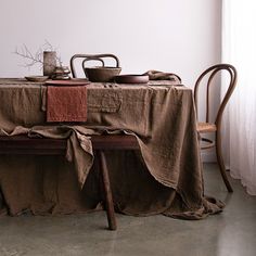 a table with a cloth draped over it