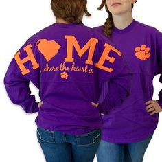 Details: Celebrate your Clemson Tigers fandom with this Logo Sweeper long sleeve tee! This spirited Jersey T-shirt features printed Clemson Tigers graphics for a spirited look. Shop for your favorite Collegiate Long Sleeve T-shirt With Relaxed Fit, Collegiate Long Sleeve T-shirt For College, Long Sleeve Graphic Print T-shirt For Sports Fans, Sports Fan Long Sleeve T-shirt, Long Sleeve Top With Team Name For Fall, Purple Tops With Team Name For Fan Gear, Purple Fan Gear Tops With Team Name, Collegiate Long Sleeve T-shirt For Football Season, Collegiate Long Sleeve T-shirt For Fans