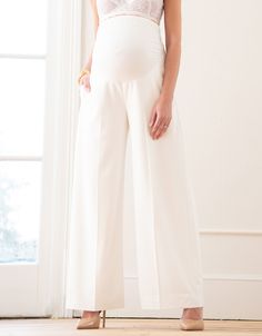 Featuring a strong and elegant silhouette, Seraphine's wide-leg over bump pants in an ivory colourway offer an ideal option for the bride who's looking for something a little different on her wedding day. Baby Wearing Coat, Maternity Dress Outfits, Maternity Pants, Occasion Dresses Wedding, Nursing Tops, Baby Shower Dresses, Shower Dresses, Luxe Wedding, Nursing Dress