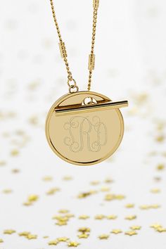 Please note that all sales are final. The Brook & York Custom Monogram Toggle Necklace offers a hint of shimmer and can be worn on its own or with any other necklace for a layer effect. This monogram necklace is the perfect custom gift for a bridesmaids, birthday for her, anniversary or a gift for yourself. Important Customization Information: A brook & york representative will reach out via email to confirm desired customization after purchase. Production time of your piece does not start until after your customization has been received. Your order will be cancelled if your customization is not confirmed within 1 week from purchase. brook & york- As an American-inspired, American-made company it is important to us that all of our jewelry is made here in the USA with supreme care and lovin Classic Round Toggle Necklace With Adjustable Chain, Classic Toggle Necklace With Adjustable Chain, Gold Necklace With Toggle Clasp For Anniversary, Minimalist Adjustable Toggle Necklace As Gift, Personalized Silver Toggle Necklace Gift, Elegant Medallion Jewelry With Toggle Clasp, Modern Necklaces With Toggle Clasp For Gift, Modern Necklace With Toggle Clasp For Gift, Elegant Medallion Toggle Necklace