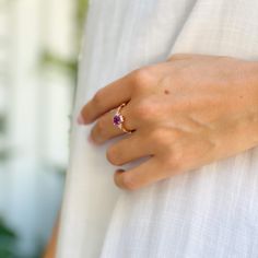 A delicate ring featuring genuine amethyst gemstone adorned with sparkling cubic zirconia. This dainty piece comes in a 14K rose gold plating over sterling silver. 

Stone Name: Amethyst | Color: Purple | 14K Gold Plated | Emerald Cut | Gift: Amethyst Promise Ring Vintage Amethyst Ring, Amethyst Ring Vintage, Promise Rings Vintage, Amethyst Engagement Ring, Amethyst Ring Engagement, Engagement Ring For Women, Amethyst Color, Ring Rose Gold, Healing Jewelry